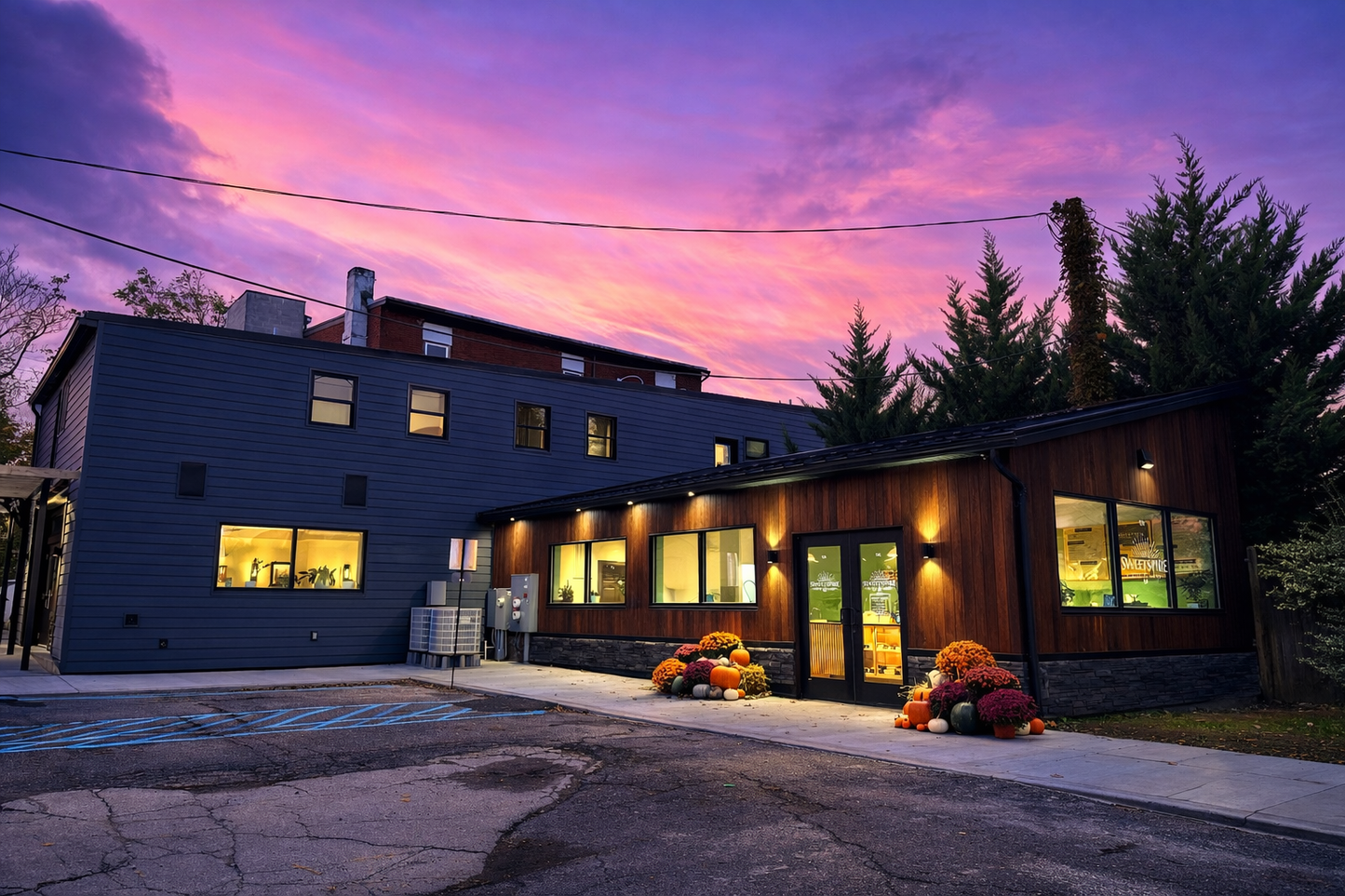 Outside view of Sweetspire Cafe with a sunset in the background