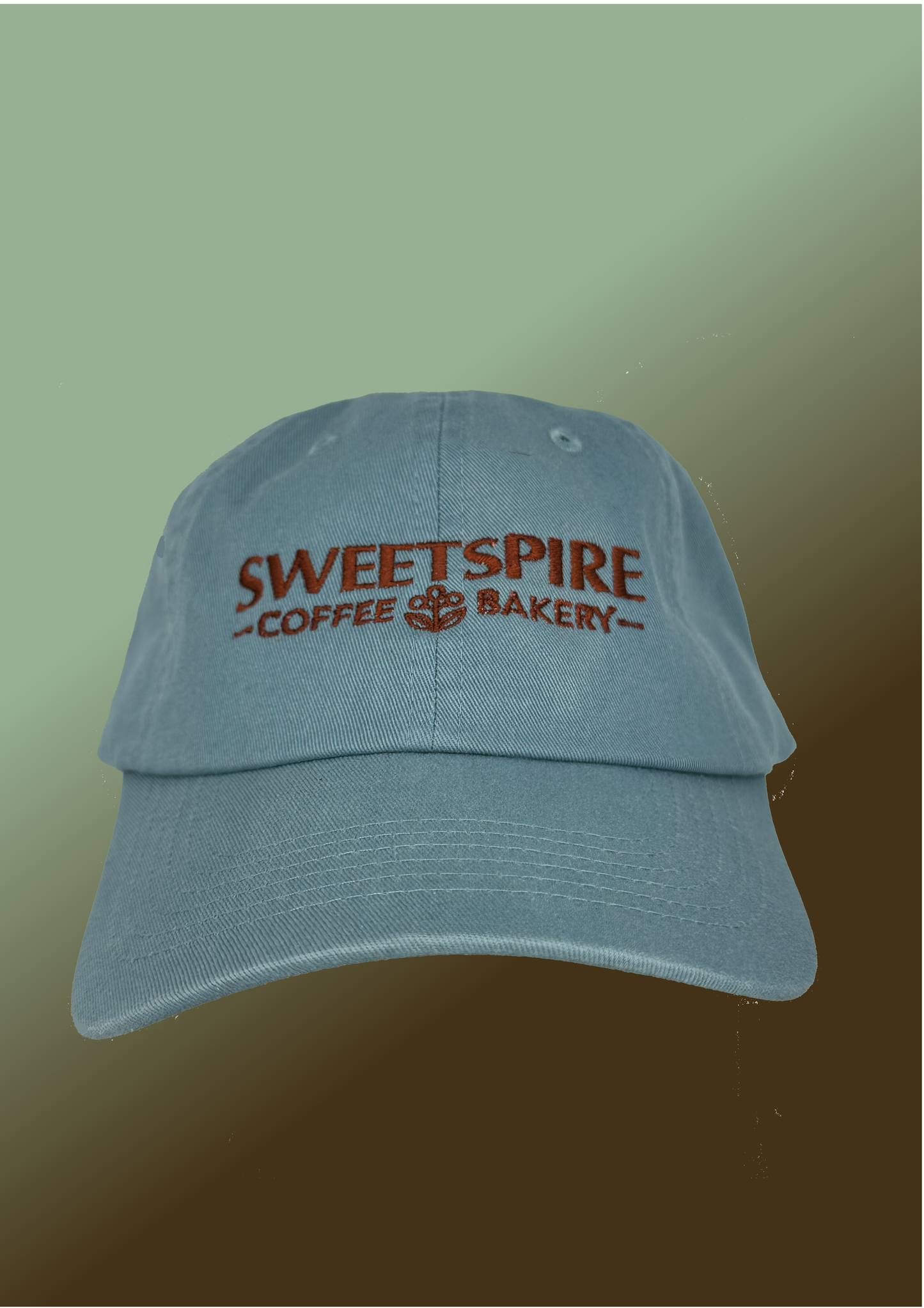Blue cap with 'Sweetspire Coffee Bakery' text on a gradient background